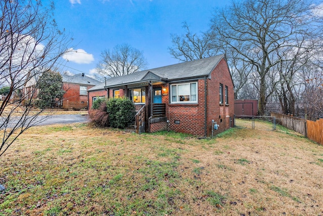 view of front of home with a front yard