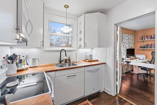 kitchen with range with electric stovetop, pendant lighting, dishwasher, sink, and white cabinets