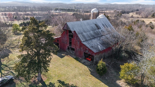 birds eye view of property featuring a mountain view