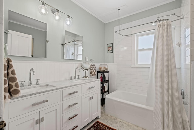 bathroom with ornamental molding, vanity, and shower / bath combo