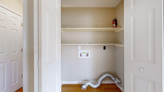 laundry area featuring hardwood / wood-style flooring and hookup for a washing machine