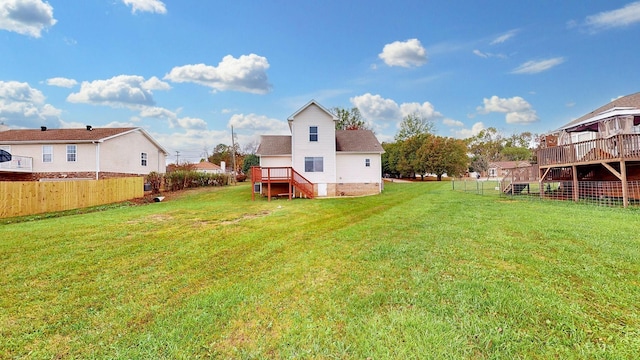 view of yard with a deck