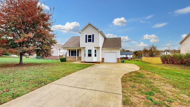 view of front of house with a garage and a front yard