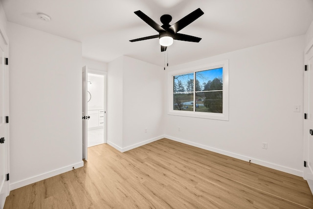 unfurnished bedroom with ceiling fan and light wood-type flooring