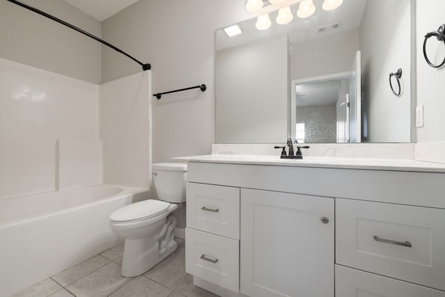 full bathroom with tile patterned floors, vanity, toilet, and tub / shower combination