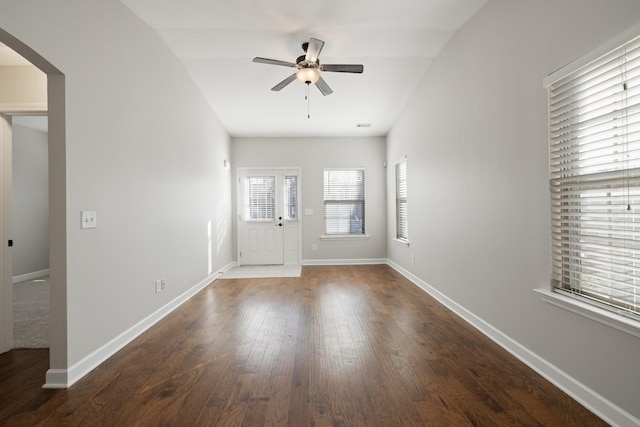 entrance foyer with ceiling fan and dark hardwood / wood-style flooring