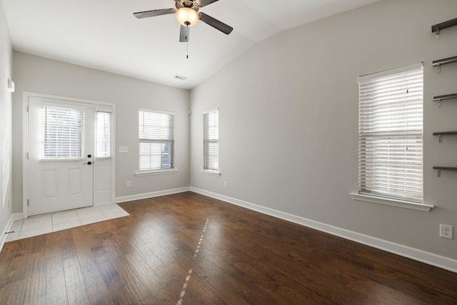 entrance foyer featuring lofted ceiling, hardwood / wood-style floors, and ceiling fan