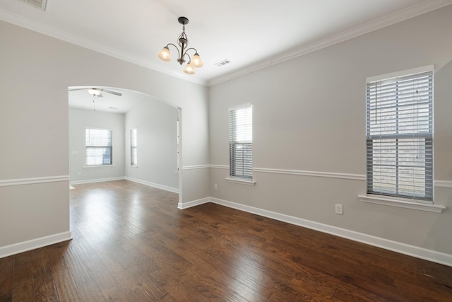 unfurnished room featuring crown molding, dark hardwood / wood-style floors, and ceiling fan with notable chandelier