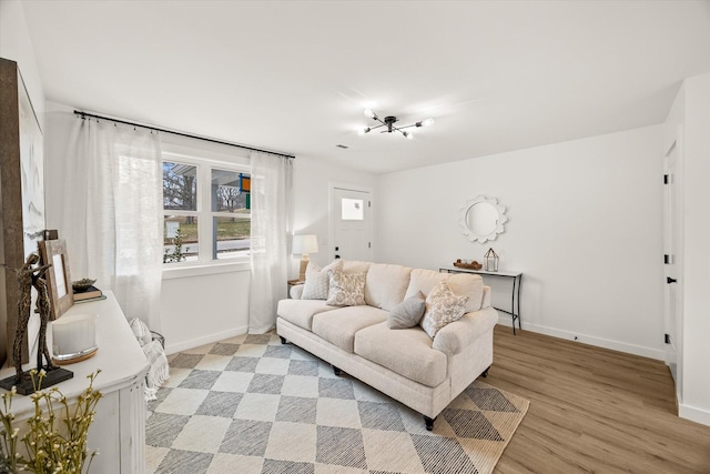 living room with light hardwood / wood-style floors