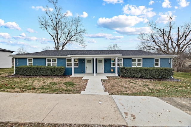 ranch-style home with a front yard