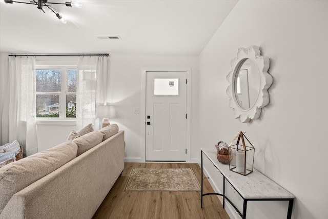 entrance foyer with light hardwood / wood-style floors