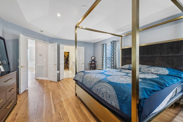 bedroom with light hardwood / wood-style flooring