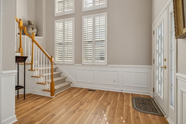 entrance foyer featuring a healthy amount of sunlight and light wood-type flooring