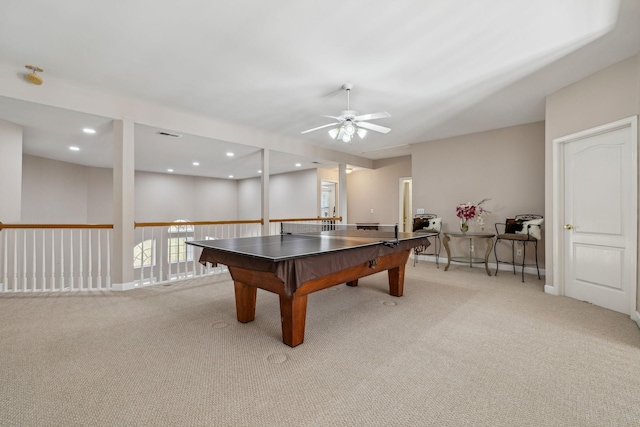 game room with ceiling fan and light colored carpet