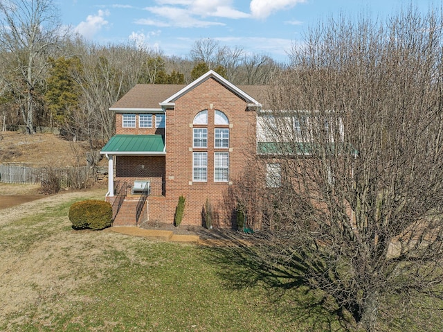 view of front of home with a front yard