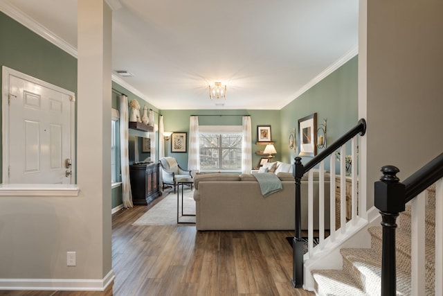 living room featuring crown molding and wood-type flooring