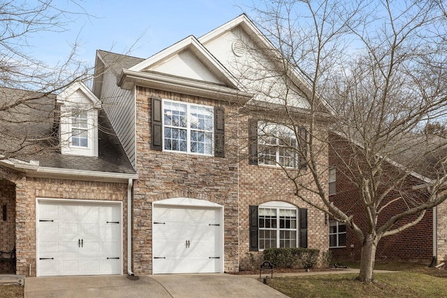 view of front of property with a garage