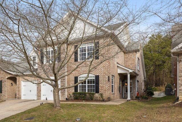 view of front facade featuring central AC, a garage, and a front yard