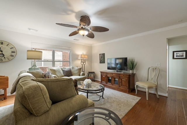 living room featuring dark wood-type flooring, ceiling fan, and ornamental molding