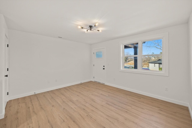 empty room featuring light hardwood / wood-style floors