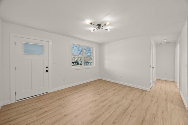 entrance foyer featuring light wood-type flooring