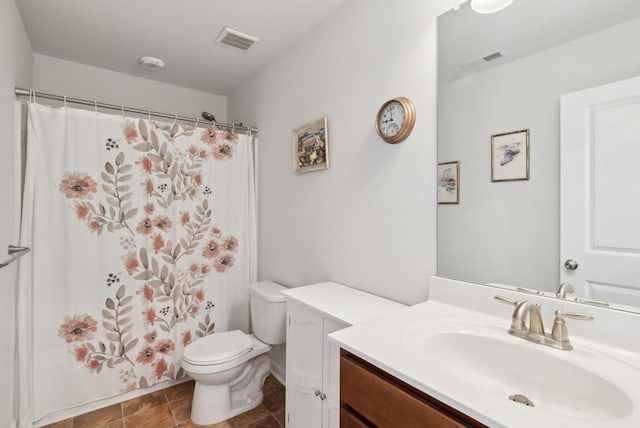 full bathroom with vanity, shower / tub combo, and toilet