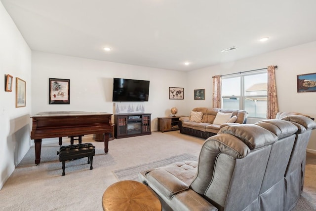 living room featuring light carpet