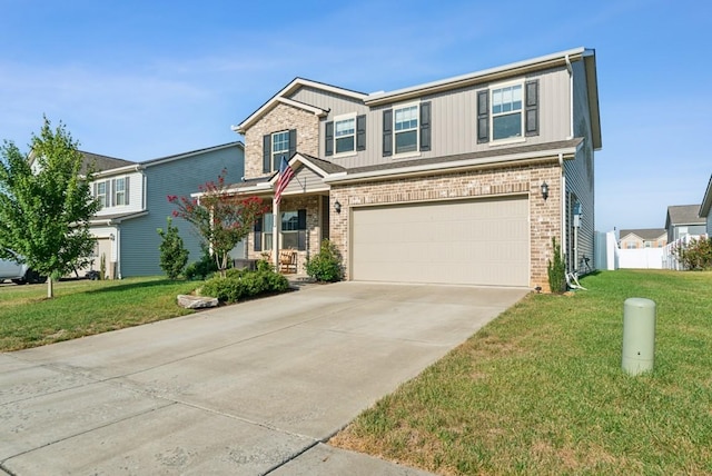 view of front of house with a garage and a front yard