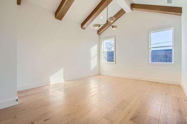 unfurnished room with a chandelier, lofted ceiling with beams, and light wood-type flooring