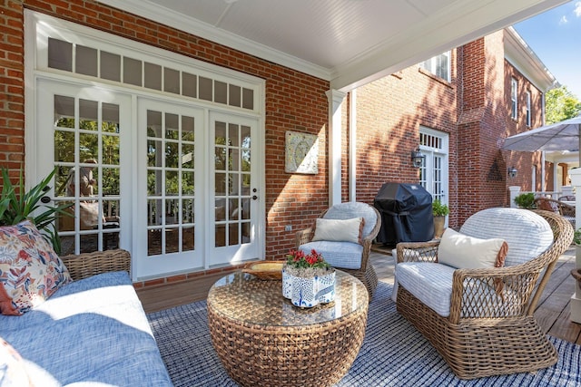 view of patio / terrace featuring french doors and a grill