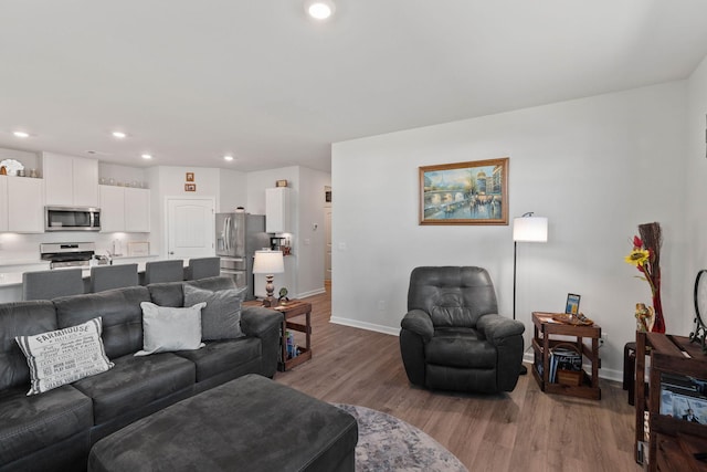 living room with light hardwood / wood-style floors