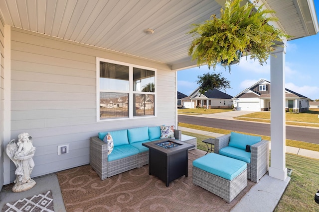 view of patio / terrace with an outdoor fire pit