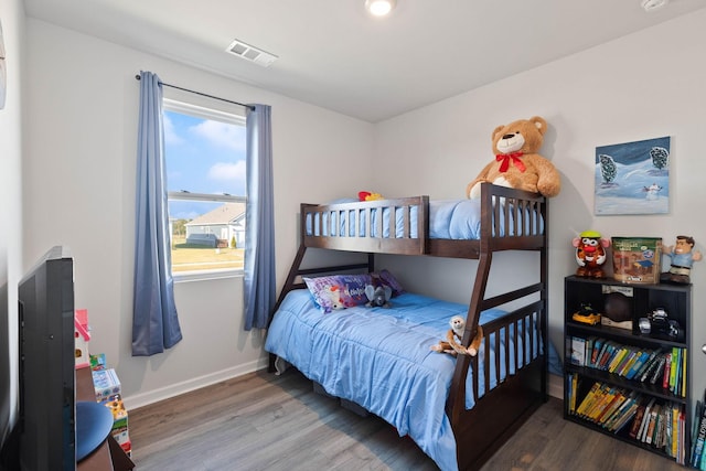 bedroom featuring hardwood / wood-style floors