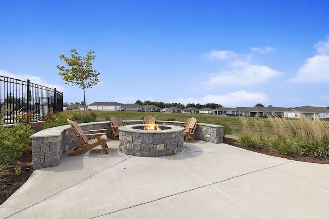 view of patio featuring a fire pit