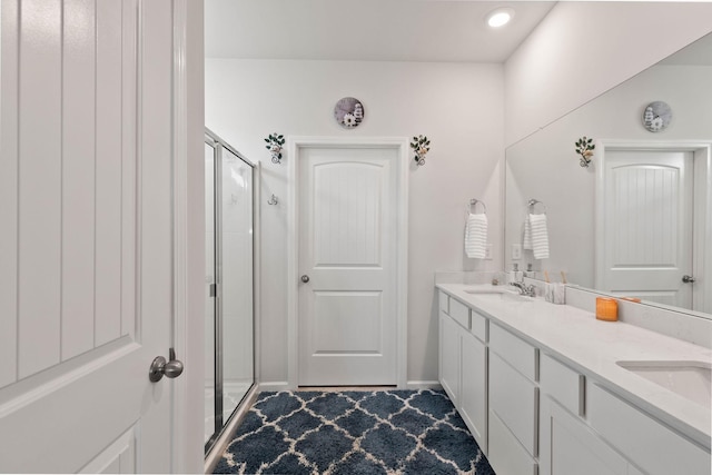 bathroom featuring vanity and walk in shower