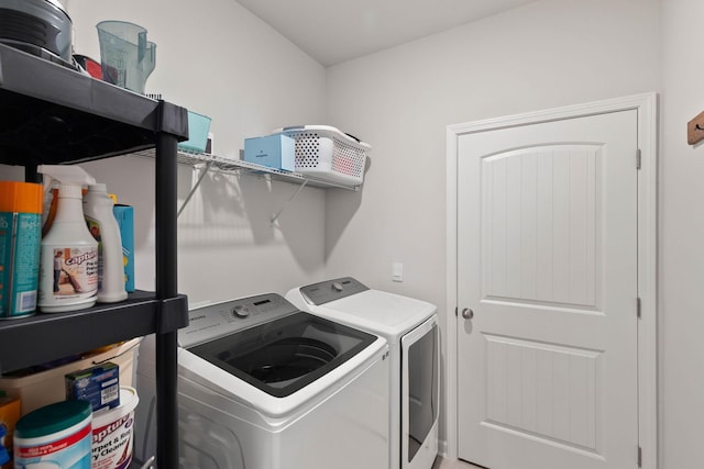 washroom with washer and clothes dryer