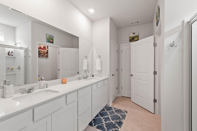 bathroom featuring vanity and tile patterned floors