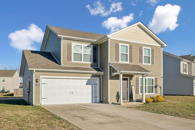 view of front of property with a garage and a front yard