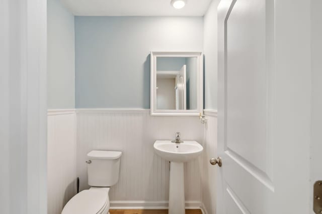 bathroom with sink and toilet