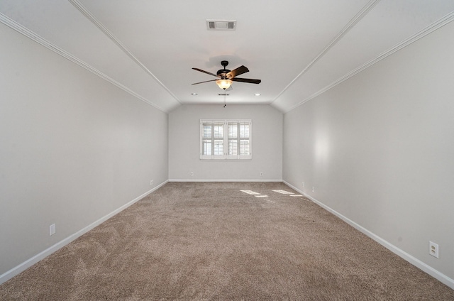 unfurnished room with vaulted ceiling, carpet, and ceiling fan