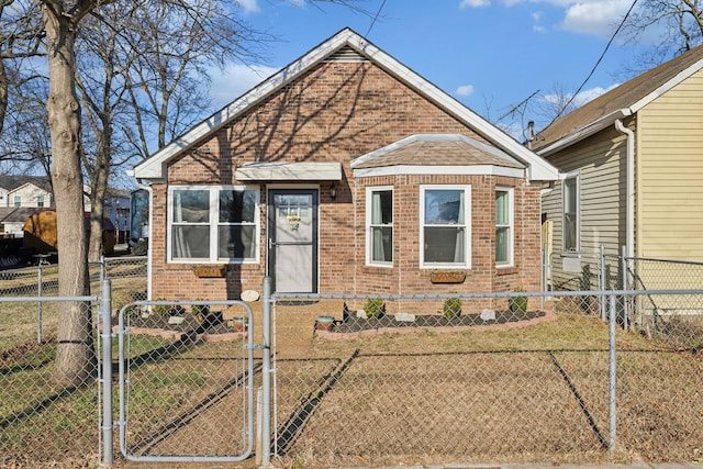 bungalow-style home with a front lawn