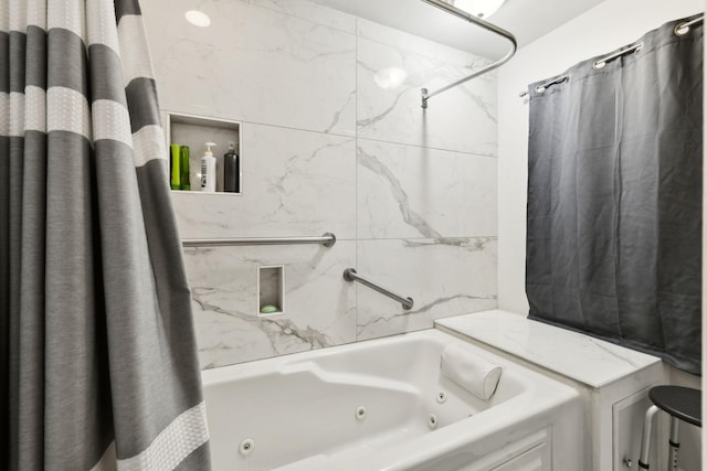 bathroom featuring shower / tub combo with curtain