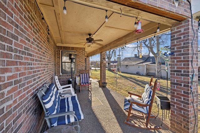 view of patio featuring ceiling fan