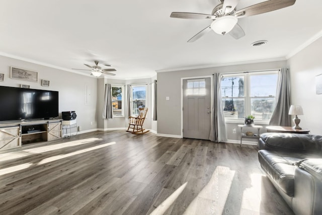 living room featuring crown molding, hardwood / wood-style floors, and ceiling fan