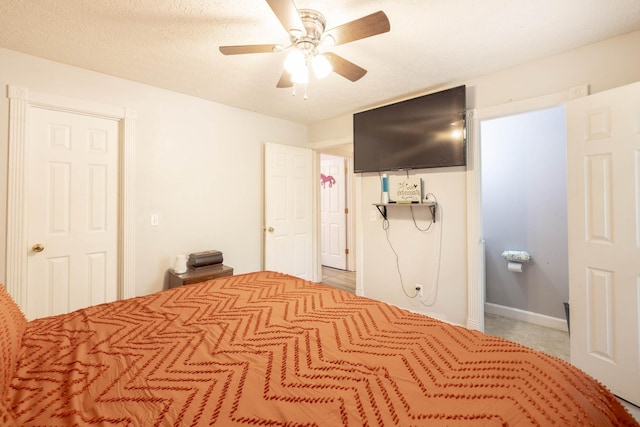 unfurnished bedroom featuring a textured ceiling and ceiling fan