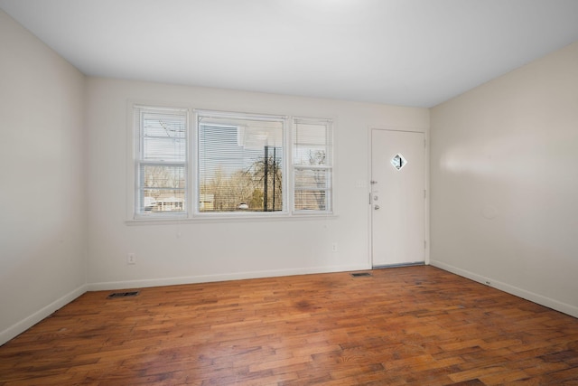 foyer entrance featuring hardwood / wood-style floors