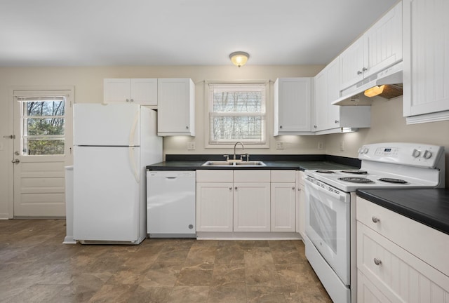 kitchen featuring white appliances, plenty of natural light, sink, and white cabinets