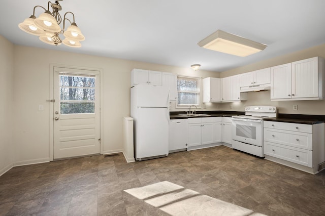 kitchen with sink, pendant lighting, white cabinets, and white appliances