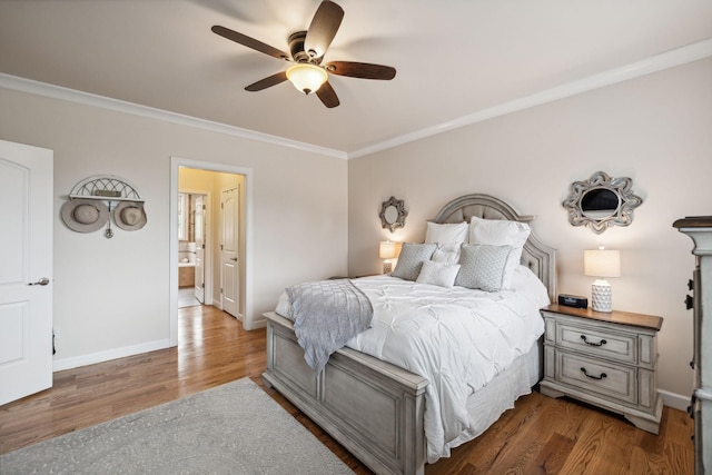 bedroom with dark hardwood / wood-style flooring, ornamental molding, and ceiling fan