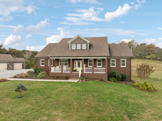 view of front of house featuring a porch and a front yard